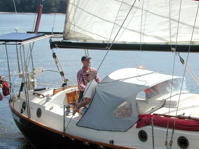 Hugh at the wheel of Longway on a daysail outing in Bateman's Bay